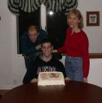 Dad, Neil, and Mom, and his ISU cake.