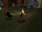 Here I am with some people hanging out at a camp fire.