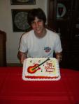 That is why his cake has a guitar on it!